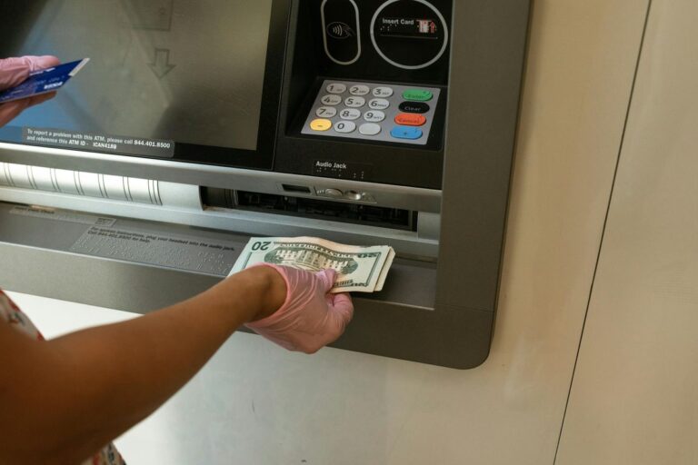 ATM cash withdrawal representing retirement savings decisions