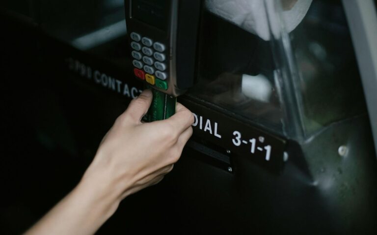 Credit card being inserted into payment terminal