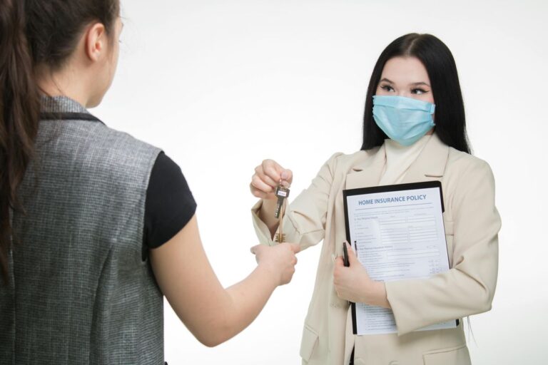 Home insurance policy and keys representing personal loan decisions